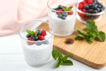 chia pudding with natural yogurt and fresh berries close-up on the table.
