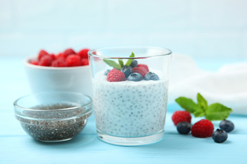 chia pudding with natural yogurt and fresh berries close-up on the table.
