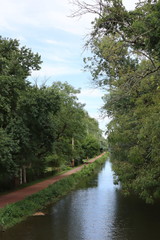 Along  the canal, it is quiet and peaceful.