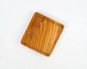 trays made of used wood, commonly used to serve food and drinks in restaurants. a tray made from recycled and polished wood waste so that it becomes an elegant and unique wooden tray.