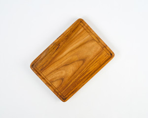 trays made of used wood, commonly used to serve food and drinks in restaurants. a tray made from recycled and polished wood waste so that it becomes an elegant and unique wooden tray.