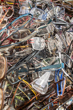a lot of old glasses on the heap