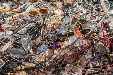 a lot of old glasses on the heap