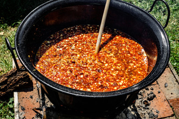 traditional Hungarian goulash soup in the cauldron