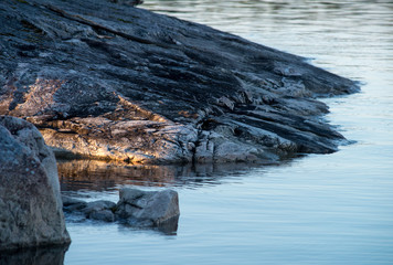 Big cracked stones and granite rocks debris.