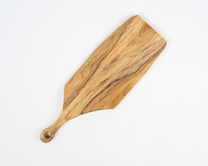 wooden chopping board used for cutting. This cutting board is also used for cutting meat and bones. Wooden cutting board that has a different and unique texture, made from recycled wood scraps.