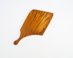 wooden chopping board used for cutting. This cutting board is also used for cutting meat and bones. Wooden cutting board that has a different and unique texture, made from recycled wood scraps.