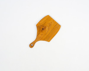 wooden chopping board used for cutting. This cutting board is also used for cutting meat and bones. Wooden cutting board that has a different and unique texture, made from recycled wood scraps.