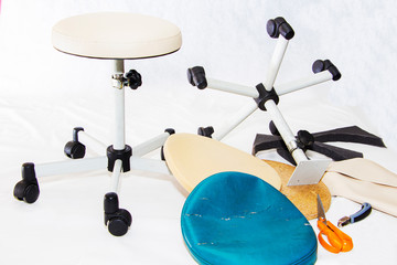 The old worn-out chair was restored. Working process of re-strapping chairs.