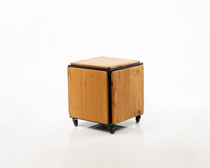 a box concept, a combination of wood and iron, so that it becomes a table and chair that is very compact and doesn't take up space.