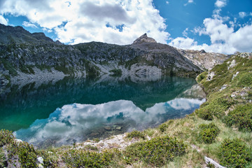 Naklejka na ściany i meble Trekking for the Vercoche lake in Valle D'Aosta, Italy