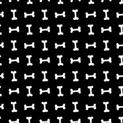 Seamless pattern with  bones. Hand drawn vector illustration on black background.