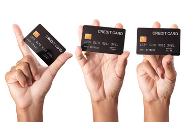 Hand holding credit card isolated on white	