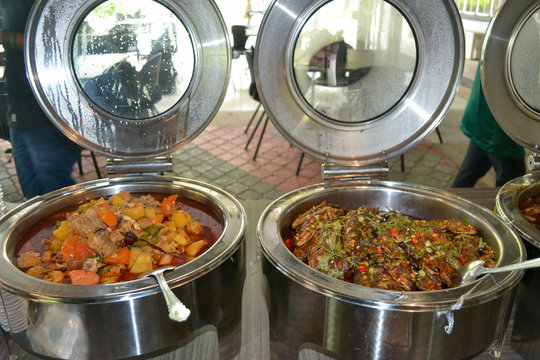 Malaysian Chicken Stew And Fish Curry In A Hotel Buffet