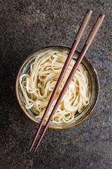 Cooked udon noodles. Traditional Japanese noodles.