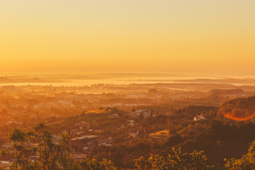 Dawn over the city. Panorama of the city in the rays of the sun.
sunset in the mountains