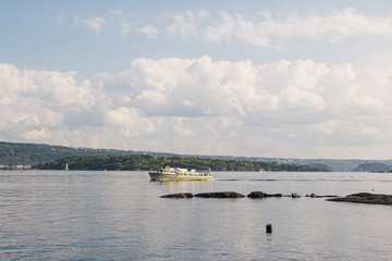 Boat crossing the river in Oslo