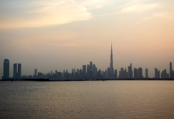 Fototapeta na wymiar Sunset over a skyline of a beautiful city of Dubai. UAE.