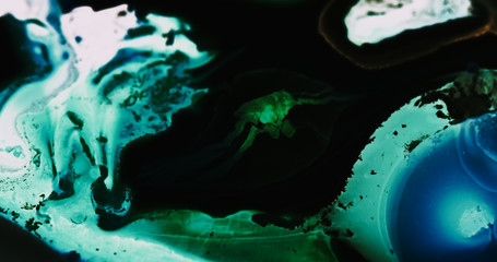 Macro Paint with Neon Color Palette. Acrylic Paint Mixed with Bright Colourful Dye and Paint.