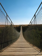 Fototapeta premium narrow bridge in the morning