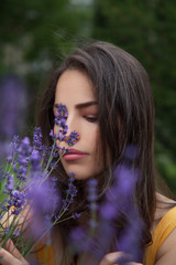 pretty young woman with lavender - 374190708