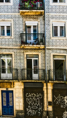 Apartment building in Lisbon with azulejo tiles covering the front