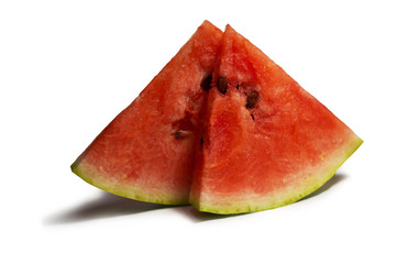 Slices of red watermelon on a white background.