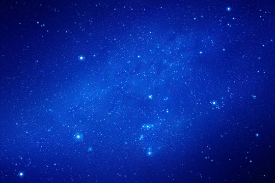 Space background with night starry sky and Milky Way. Vector illustration with our galaxy in cosmos. Dark blue backdrop with fragment of universe
