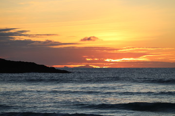 Fototapeta premium sunset over the sea, hosta beach, north uist, hebrides, scotland