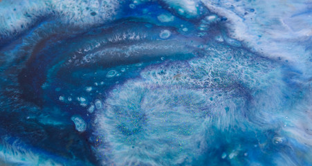 Close-up picture. Colorful background of abstract painting. High quality parts, epoxy resin.