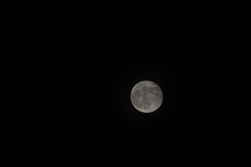 Very detailed moon in the sky on black background