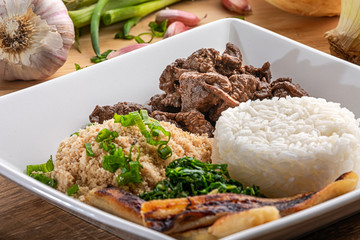 Minced beef tenderloin. Traditional Brazilian food (Picadinho). Selective focus