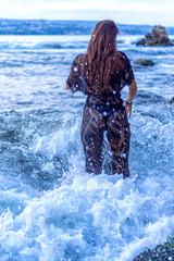 Fototapeta premium young woman in the sea
