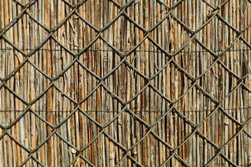 metal and reed fence background