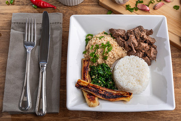 Minced beef tenderloin. Traditional Brazilian food (Picadinho). Selective focus. Top view.