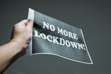 Protestors at the nation's capitol demand an end to the government shutdown. Protester holding a...