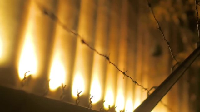 Montreal, Canada - November 20, 2018: Barbed wire or illegal immigration fence from refugees. Illegal immigration or prison fence