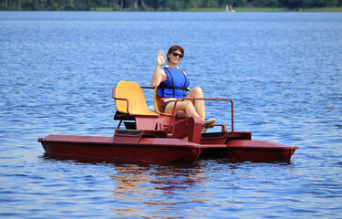 woman swims on the lake