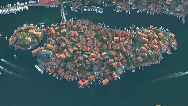Coastal village on island, aerial view. Densely populated with houses placed tight together. Beautiful scene from the archipelago.