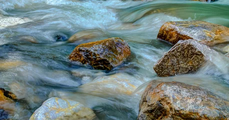Fotobehang Bos rivier Wild water running over rocks  © Marcel