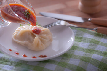 A delicious, diet dish. Steam dumplings. Korean dumplings.