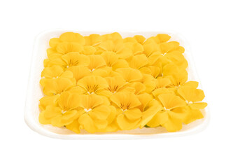 Tray of yellow pansy flowers for the kitchen