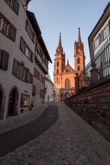 Naklejka premium Basler Munster or Basel Minster Cathedral facade view a red wall church on overcast weather day in Basel 