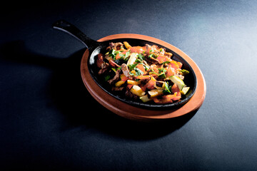 fried meat with vegetables