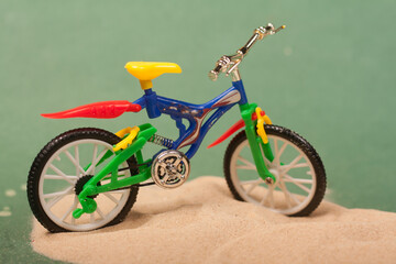 Fototapeta na wymiar Bike on a green background