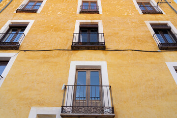 Touristic facade in Cuenca Spain of residential houses in the center of the city