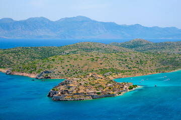 Obraz premium Island of Spinalonga with old fortress former leper colony and the bay of Elounda, Crete island, Greece