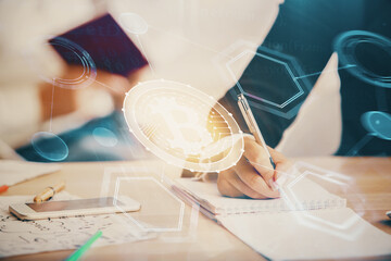 Double exposure of blockchain theme drawing over people taking notes background. Concept of cryptocurrency