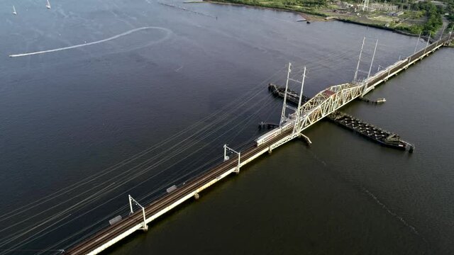 Aerial view of train crossing the Raritan Bay Swing Bridge between Perth Amboy and South Amboy, NJ