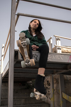 young woman urban skater concept of sport and health physical activity campaign